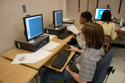 Students at computer in classroom