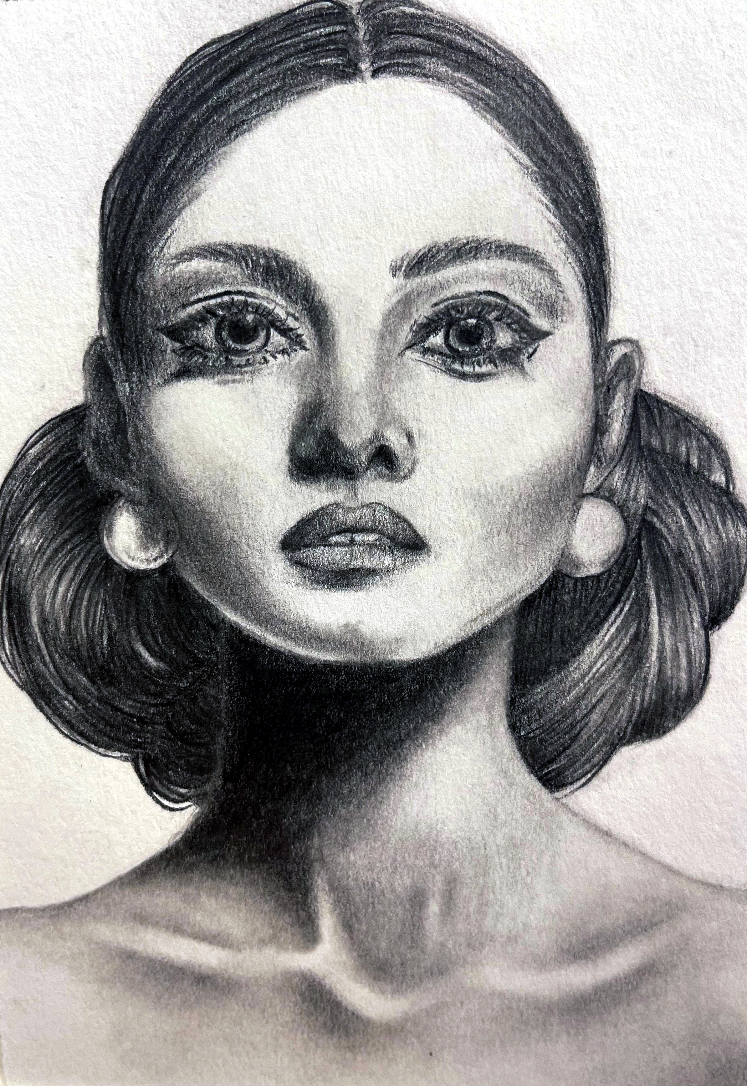 Portrait of a young woman's head and shoulders, hair pulled back and styled and wearing earrings. Medium: Graphite