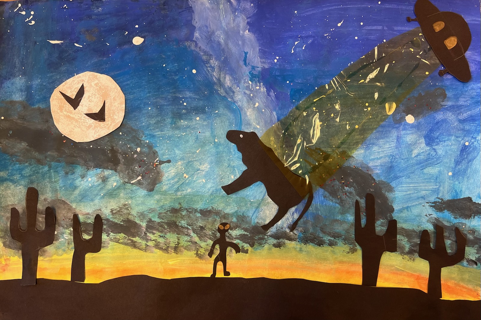 Collage of tempera paint, clear cellophane and paper shapes. Mixed media: tempera paint, clear cellophane and paper collage.