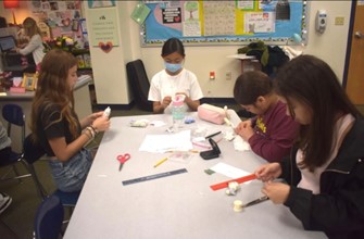 Children sewing