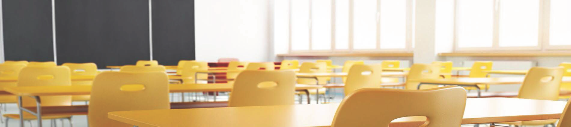 Classroom with desks and chalkboard